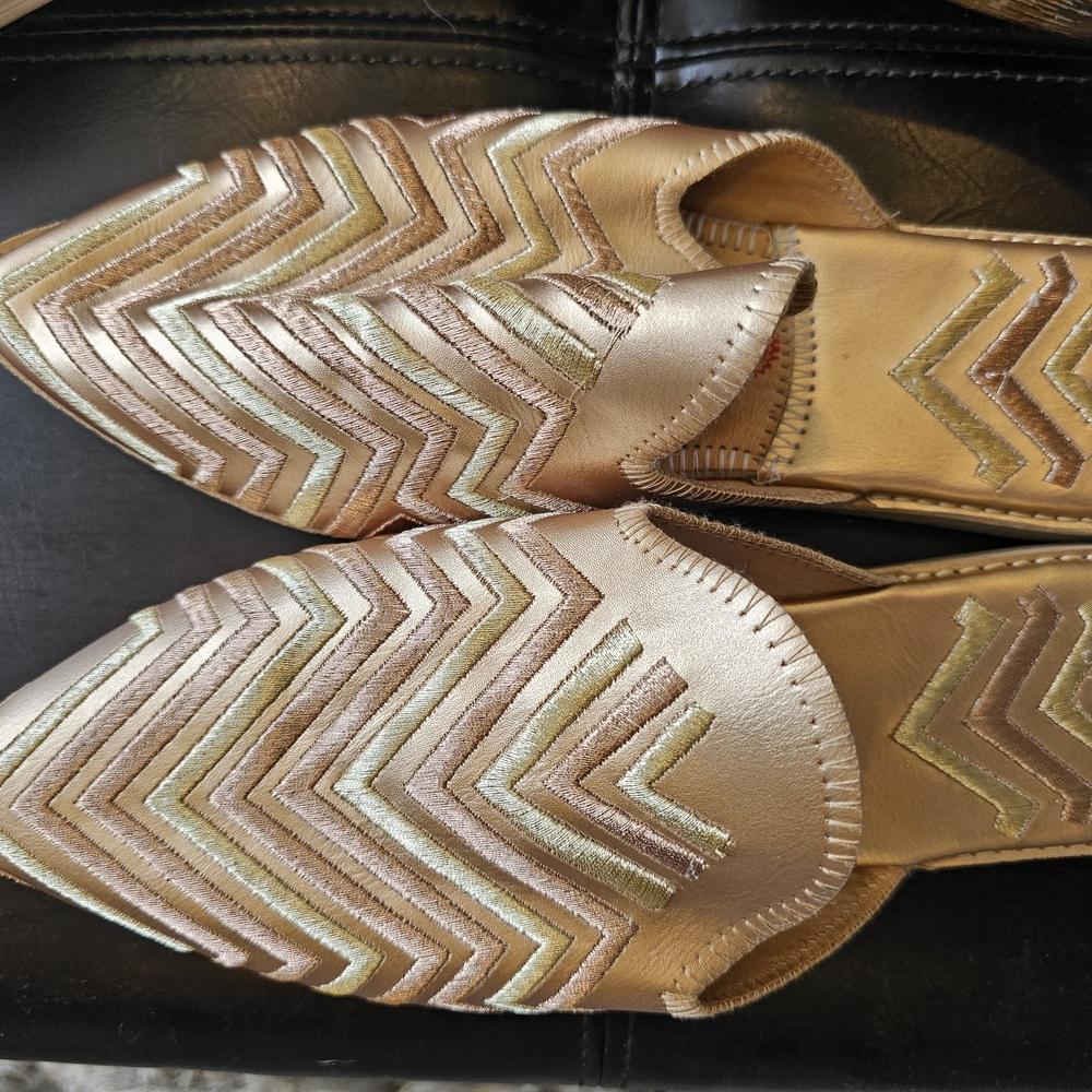 Elegant Women's Gold and Cream Flats
